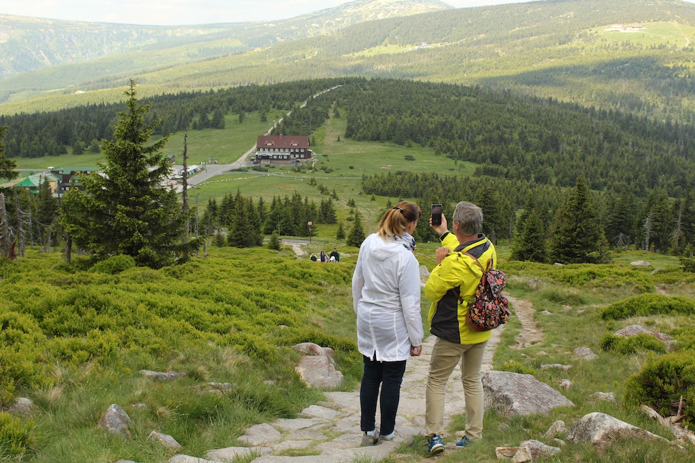 A man and a woman hiking together