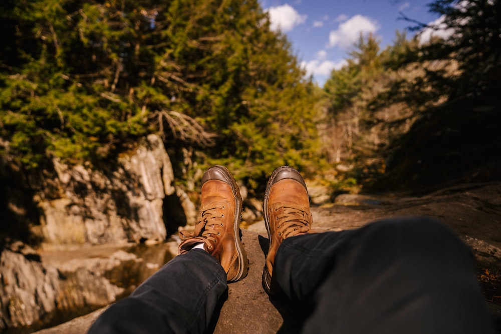 Man wearing brown hiking shoes