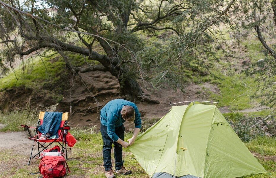 Man setting a tent