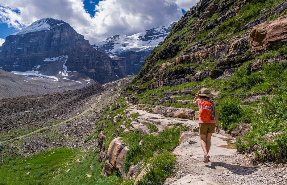Woman hiking in the mountains in summer